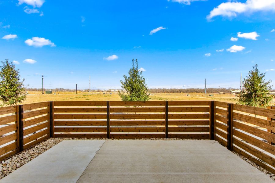 Exterior details and patio area of a home in Wildridge, Oak Point (Image 20).