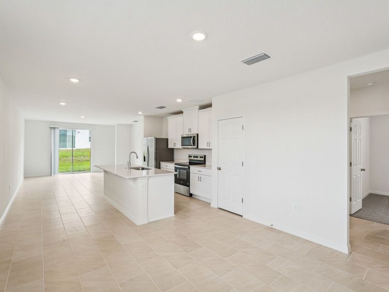 Furnished interior view inside a new home in Villamar - Classic Series, Winter Haven (Image 3).