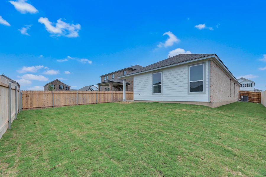 Front exterior of a new home in Salerno - Heritage Collection, Round Rock, TX, highlighting curb appeal (Image 22). Front exterior of a new home in Salerno - Heritage Collection, Round Rock, TX, highlighting curb appeal (Image 22).