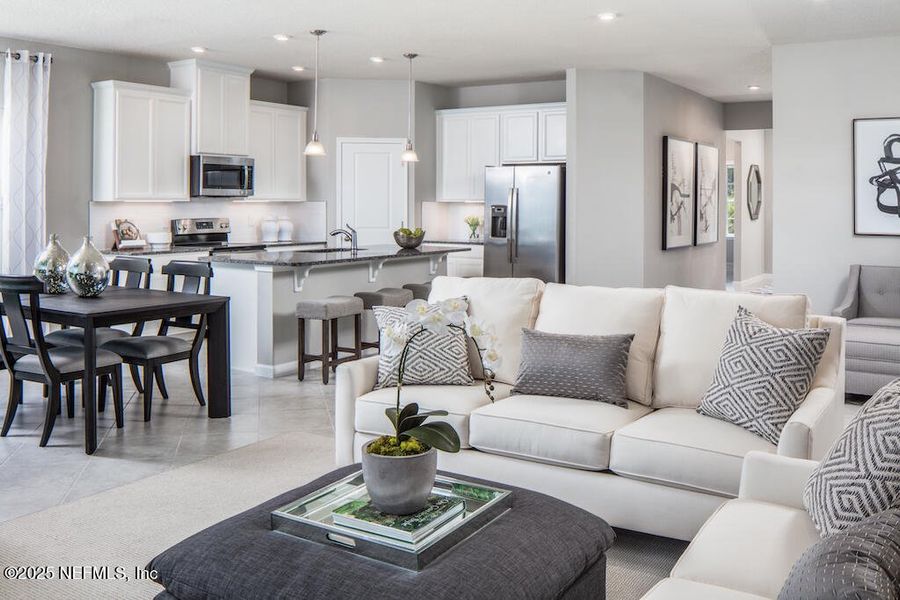 Furnished interior view inside a new home in Seminole Palms Single-Family Homes, Palm Coast (Image 5).