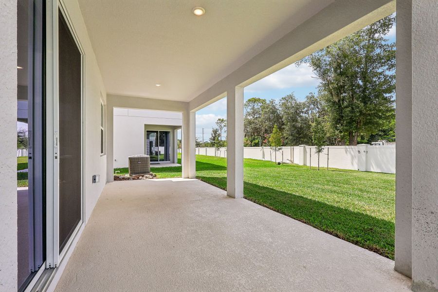 Exterior details and patio area of a home in Harrell Oaks, Orlando (Image 2). Exterior details and patio area of a home in Harrell Oaks, Orlando (Image 2).