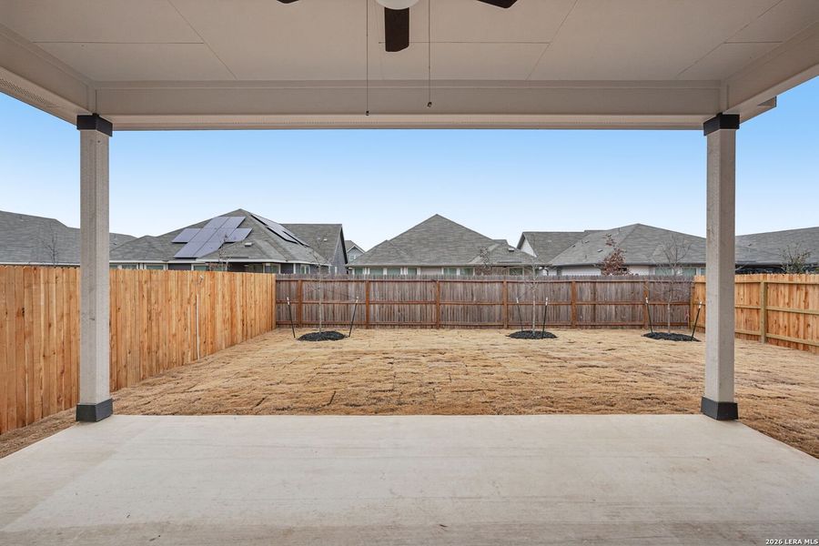 Exterior details and patio area of a home in Estancia Ranch - Premier Series, San Antonio (Image 3).