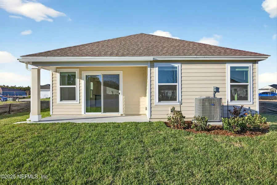 Exterior details and patio area of a home in , Palm Coast (Image 4). Exterior details and patio area of a home in , Palm Coast (Image 4).