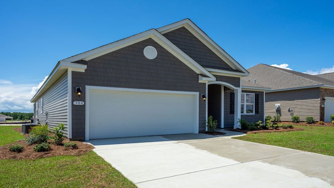 Representative exterior photo of a completed home built from the EATON by D.R. Horton in Waterbridge, Myrtle Beach, SC (Image 22).