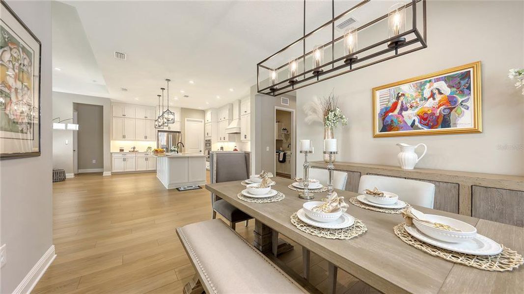 Formal Dining Room with stylish lighting