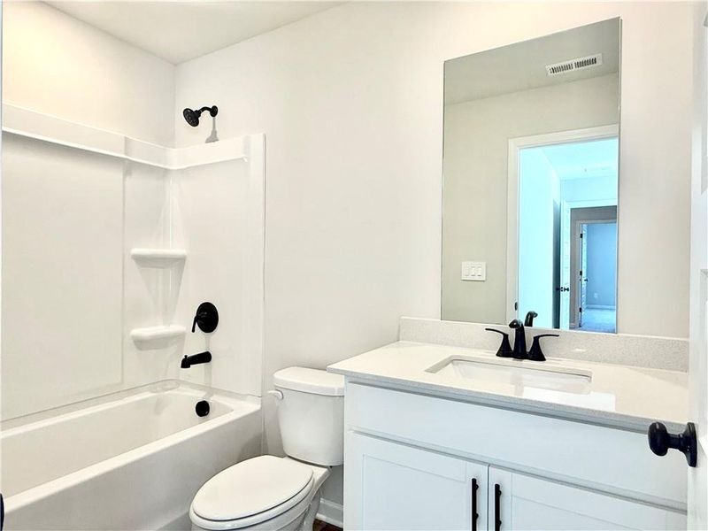 Furnished interior view inside a new home in Vines at Mill Creek - Estate Series, Braselton (Image 13). Furnished interior view inside a new home in Vines at Mill Creek - Estate Series, Braselton (Image 13).