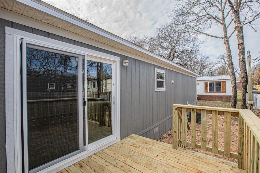 Exterior details and patio area of a home in , Pelican Bay (Image 4).