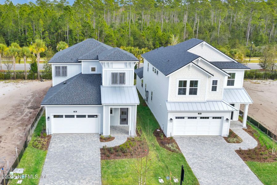 Front exterior of a new home in , Ponte Vedra, FL, highlighting curb appeal (Image 27).