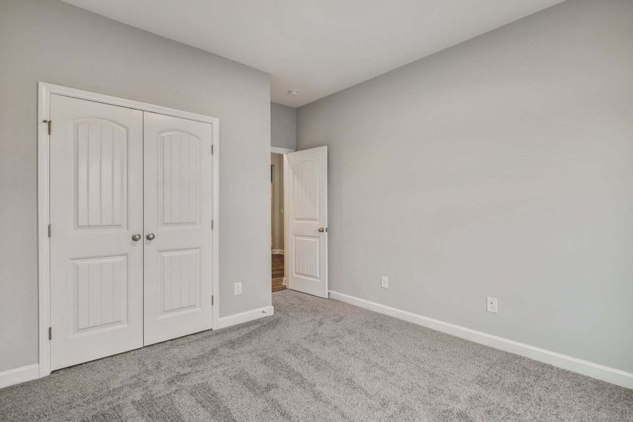 Representative unfurnished interior of a home built from the Garland by Caviness & Cates Communities in Bartlett Manor, Youngsville (Image 239). Representative unfurnished interior of a home built from the Garland by Caviness & Cates Communities in Bartlett Manor, Youngsville (Image 239).