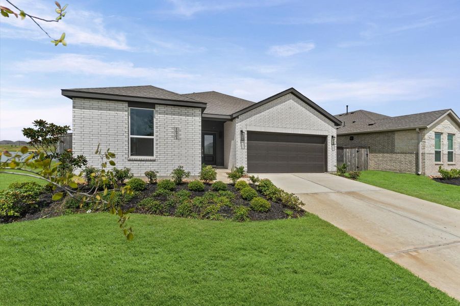 Front exterior of a new home in The Grand Prairie, Hockley, TX, highlighting curb appeal (Image 22).