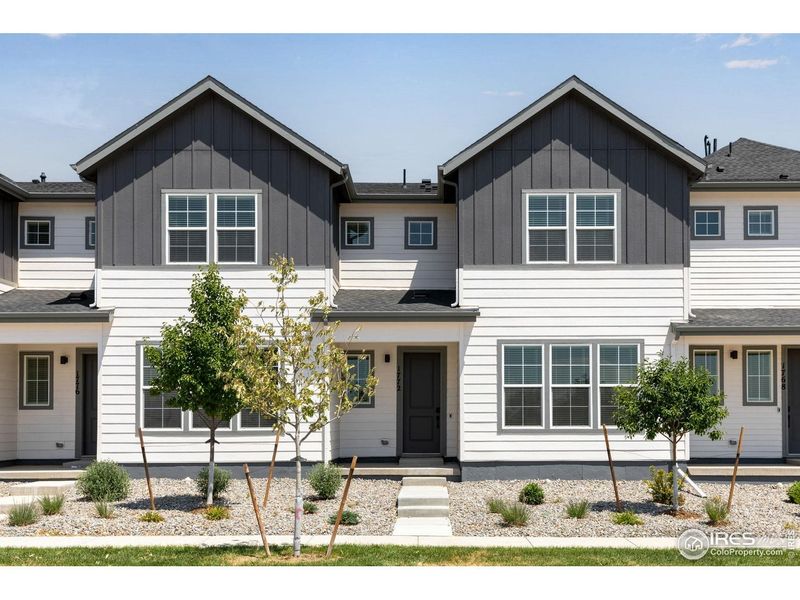 Front exterior of a new home in , Berthoud, CO, highlighting curb appeal (Image 20).