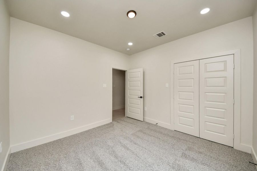 A versatile space perfect for a nursery, guest suite, or home office