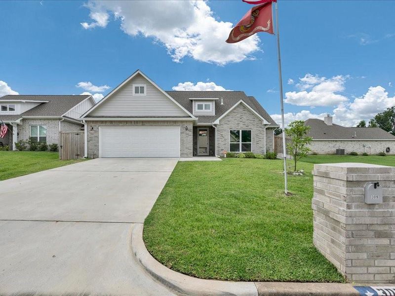 Front exterior of a new home in , Lufkin, TX, highlighting curb appeal (Image 25).