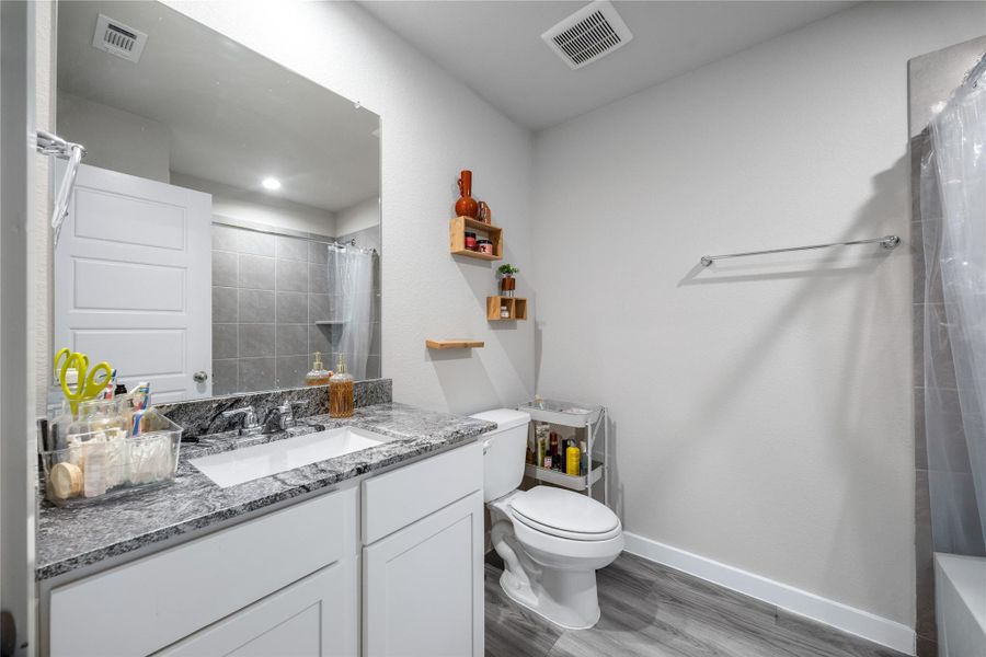 Furnished interior view inside a new home in , Cypress (Image 25).