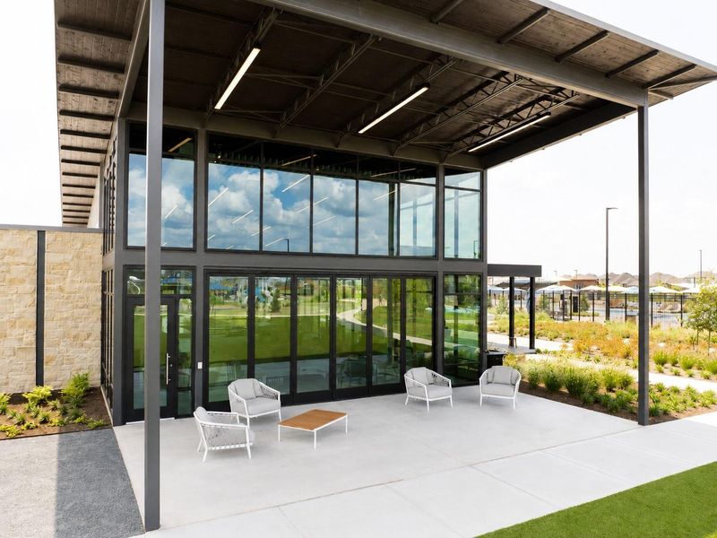 The contemporary clubhouse provides an inviting gathering space for residents, with stylish indoor and outdoor areas designed for meeting neighbors, relaxing, or enjoying community events throughout the year. The contemporary clubhouse provides an inviting gathering space for residents, with stylish indoor and outdoor areas designed for meeting neighbors, relaxing, or enjoying community events throughout the year.