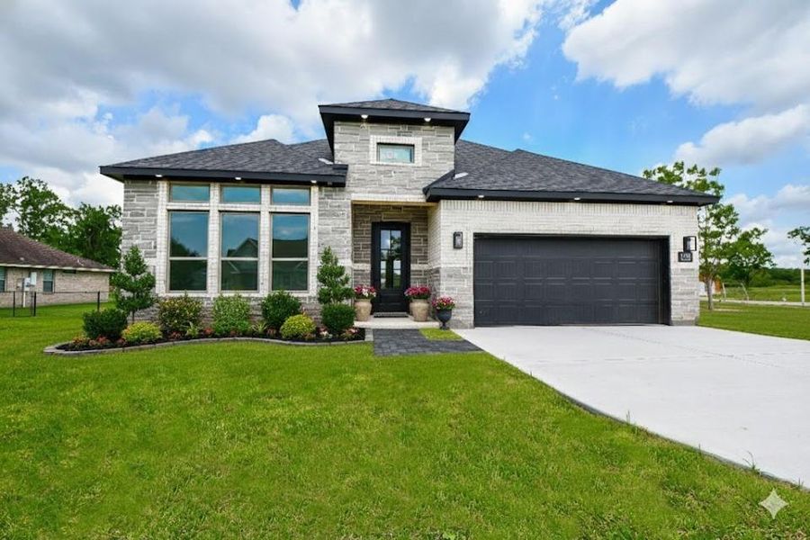 Front exterior of a new home in , Sweeny, TX, highlighting curb appeal (Image 1). Front exterior of a new home in , Sweeny, TX, highlighting curb appeal (Image 1).