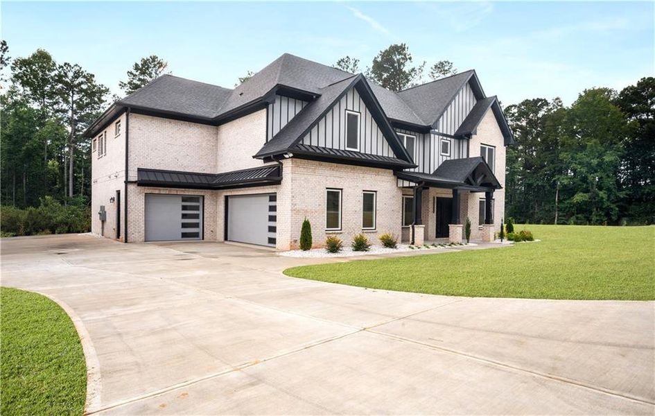 Front exterior of a new home in , Buford, GA, highlighting curb appeal (Image 1).