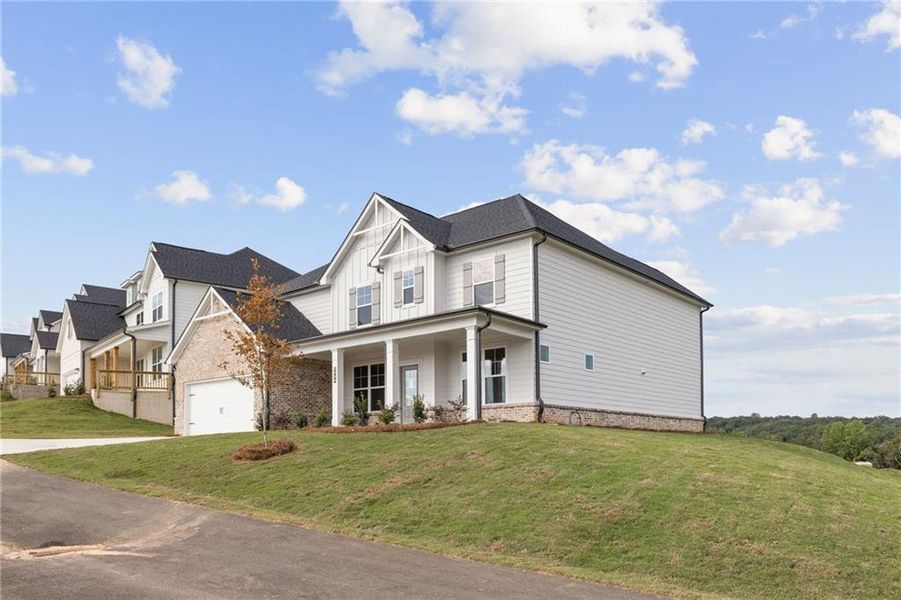 Front exterior of a new home in The Estates at Gainesville Township, Gainesville, GA, highlighting curb appeal (Image 10).