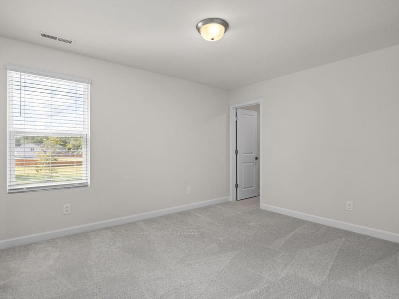 Spacious, unfurnished interior of a new home in Wellers Knoll, Lillington (Image 24).