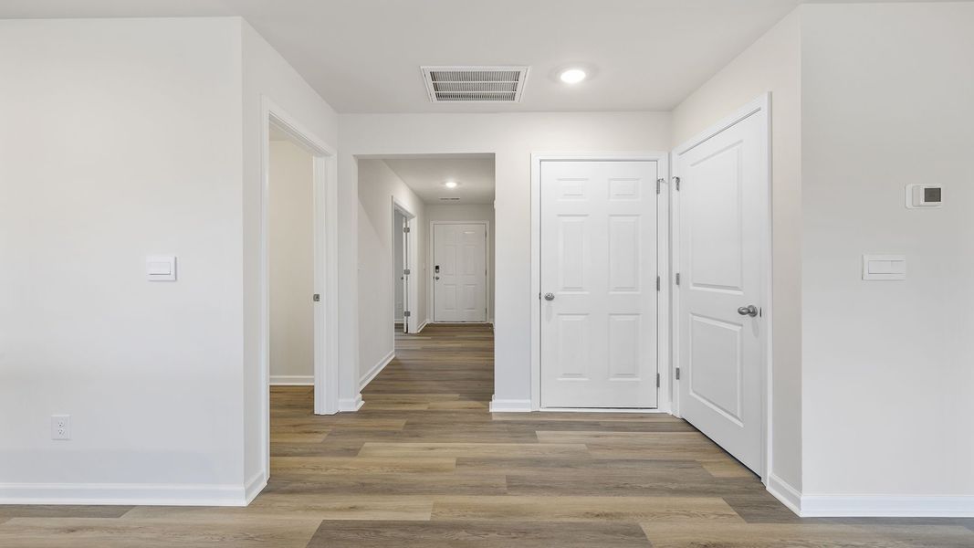 Spacious, unfurnished interior of a new home in Bentley Park, Greenwood (Image 15).