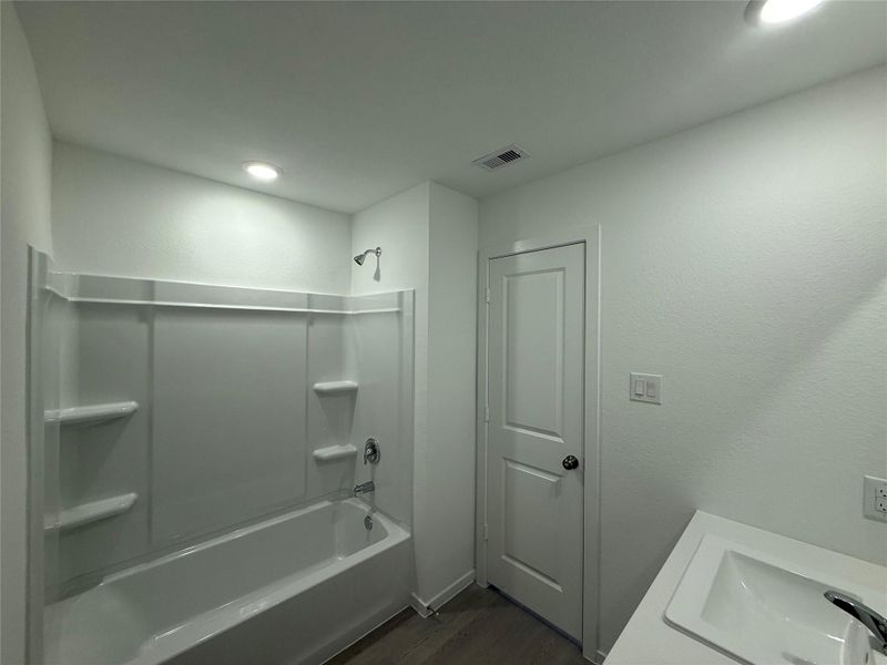 Furnished interior view inside a new home in Sweetgrass Village: Cottage Collection, Crosby (Image 3).