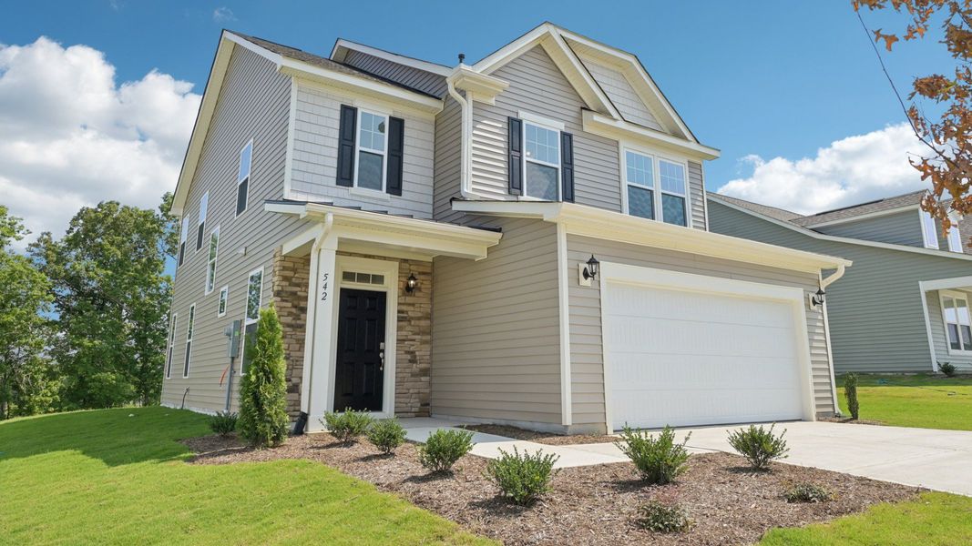 Front exterior of a new home in The Farm at Neill's Creek, Lillington, NC, highlighting curb appeal (Image 21).