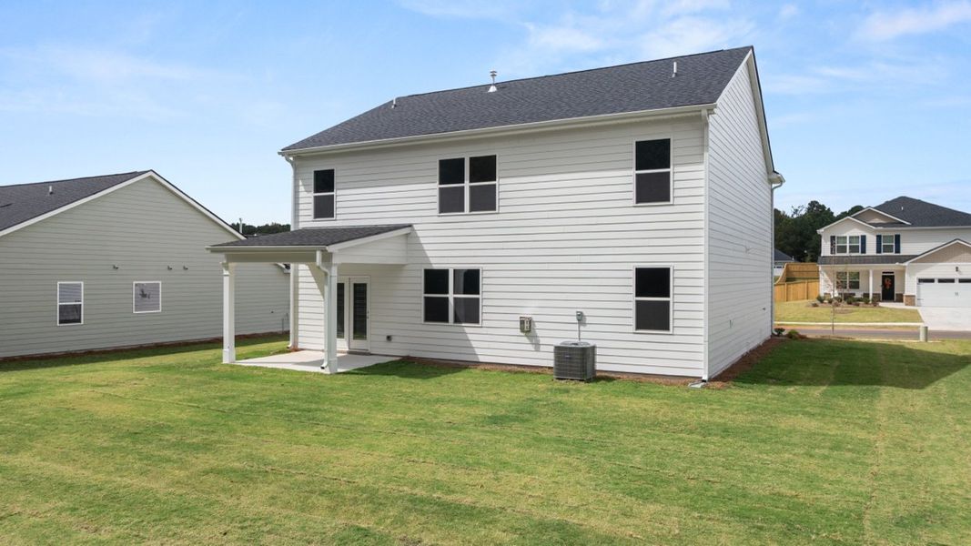 Exterior details and patio area of a home in Preserve at Dove Creek, Statham (Image 24). Exterior details and patio area of a home in Preserve at Dove Creek, Statham (Image 24).