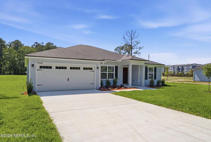 Front exterior of a new home in , Jacksonville, FL, highlighting curb appeal (Image 2). Front exterior of a new home in , Jacksonville, FL, highlighting curb appeal (Image 2).