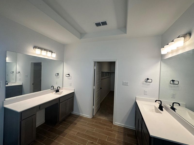 Furnished interior view inside a new home in Creekhaven, Iowa Colony (Image 14).