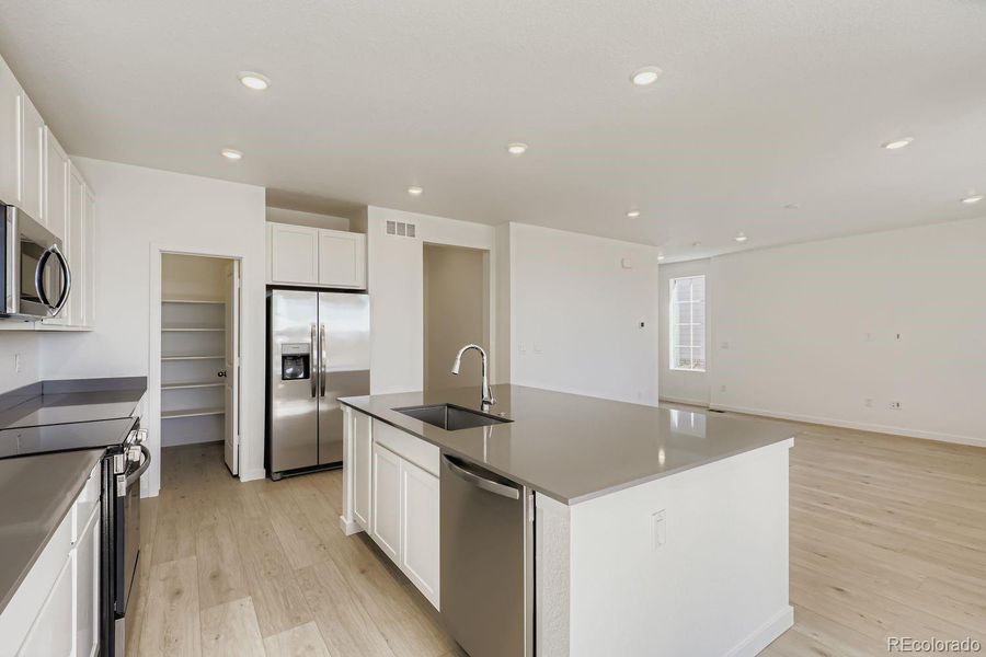 Furnished interior view inside a new home in Parterre: Paired Homes, Thornton (Image 6). Furnished interior view inside a new home in Parterre: Paired Homes, Thornton (Image 6).