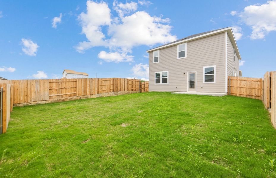 Exterior details and patio area of a home in Sunfield, Buda (Image 26).