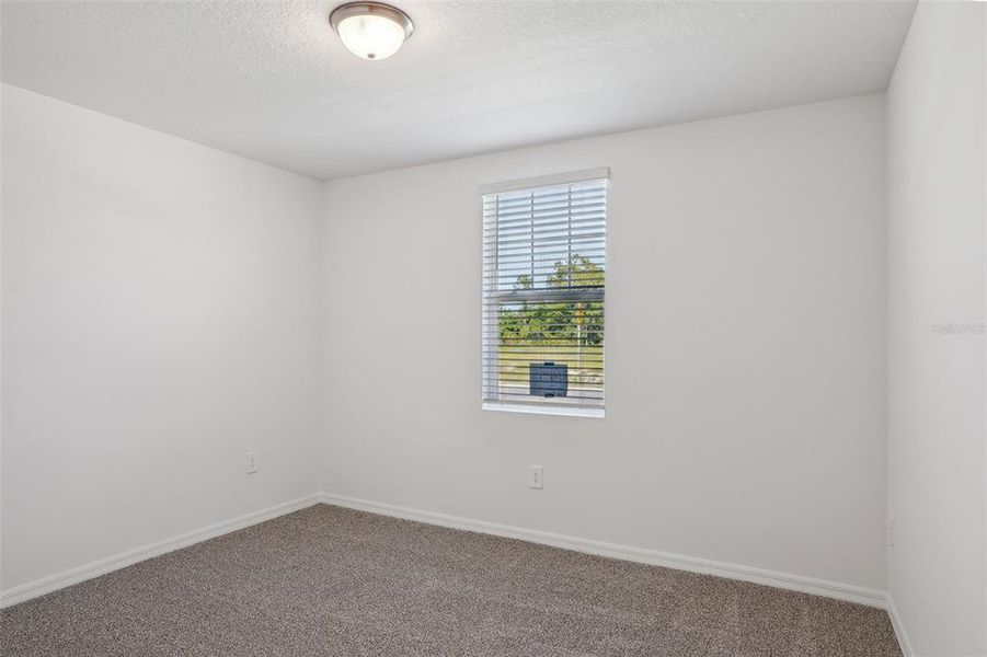 Spacious, unfurnished interior of a new home in Lake Deer Estates - Signature Series, Poinciana (Image 36). Spacious, unfurnished interior of a new home in Lake Deer Estates - Signature Series, Poinciana (Image 36).