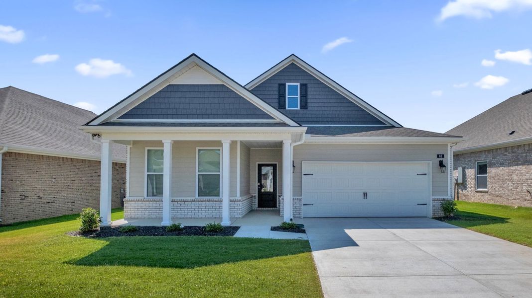 Front exterior of a new home in The Orchard, Millington, TN, highlighting curb appeal (Image 1). Front exterior of a new home in The Orchard, Millington, TN, highlighting curb appeal (Image 1).