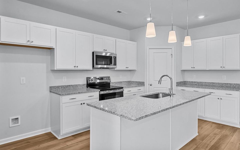 Furnished interior view inside a new home in , Summerville (Image 7).