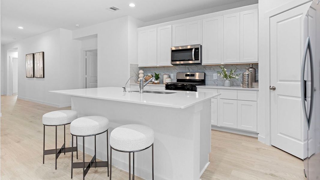 Furnished interior view inside a new home in Tamarron, Fulshear (Image 6).