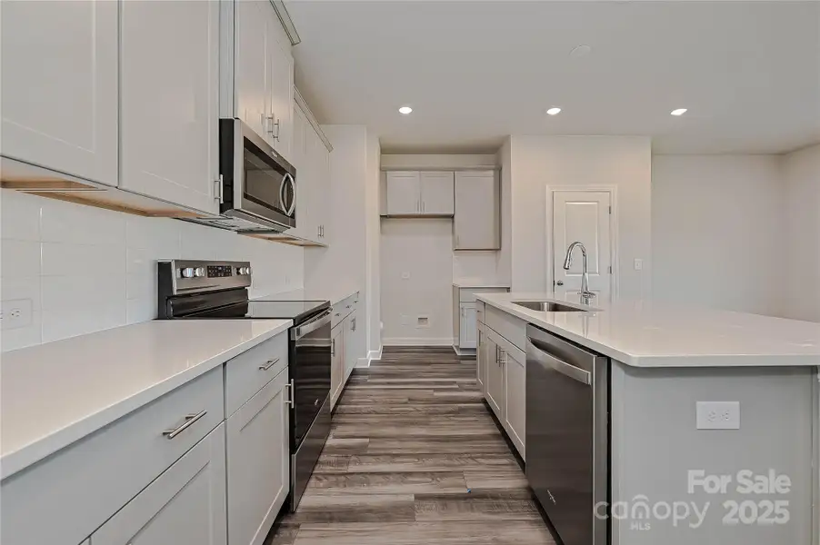 Furnished interior view inside a new home in Walnut Reserve, Conover (Image 4).