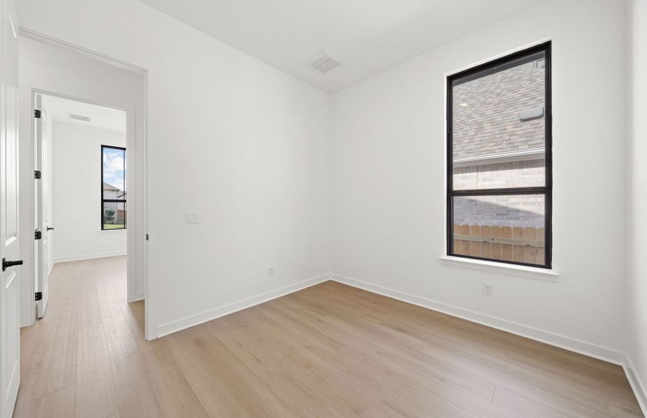 Representative unfurnished interior of a home built from the Dobbin by Pulte Homes in 6 Creeks, Kyle (Image 45).