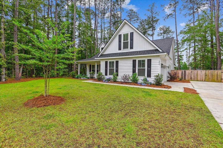Front exterior of a new home in , Summerville, SC, highlighting curb appeal (Image 1). Front exterior of a new home in , Summerville, SC, highlighting curb appeal (Image 1).