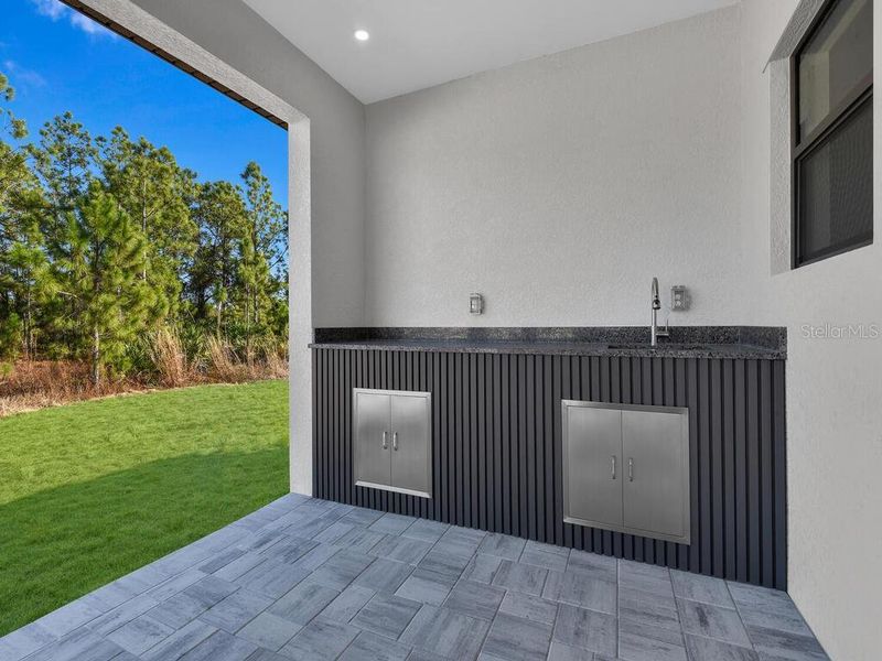 Exterior details and patio area of a home in , Lehigh Acres (Image 23).