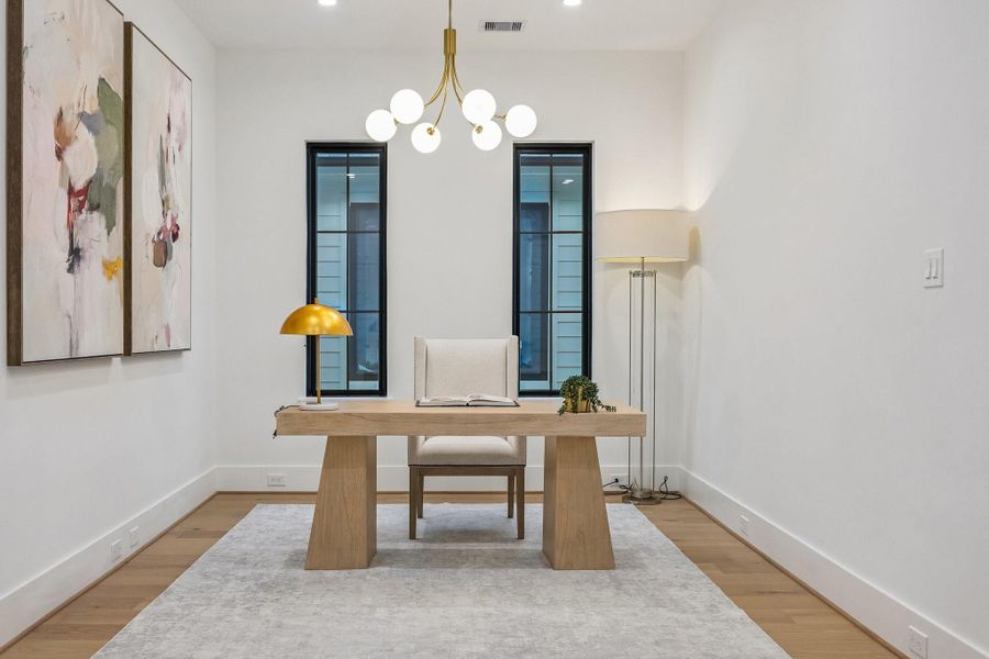 Upstairs Media Room, Study or Lounge, the possibilities are endless.  There is a Conduit on the wall for a TV and a 6-Light Modern Gold Sputnik Chandelier.