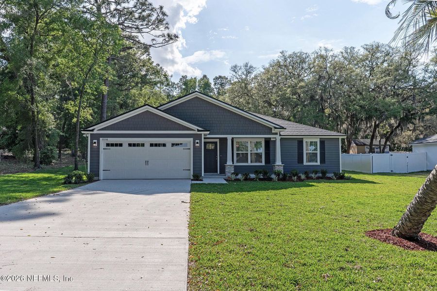 Front exterior of a new home in , Jacksonville, FL, highlighting curb appeal (Image 25).
