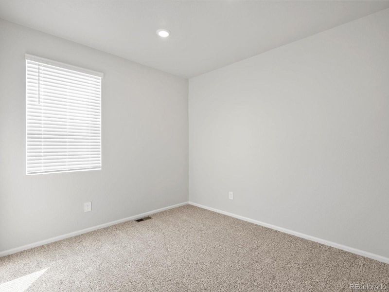 Spacious, unfurnished interior of a new home in Poudre Heights: The Lakes Collection, Windsor (Image 15).