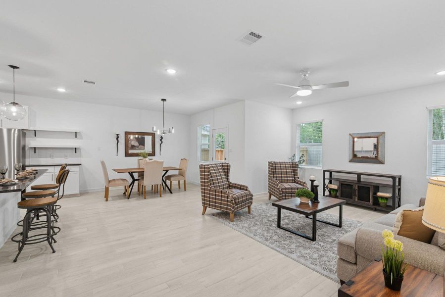 Open great room and dining area Open great room and dining area