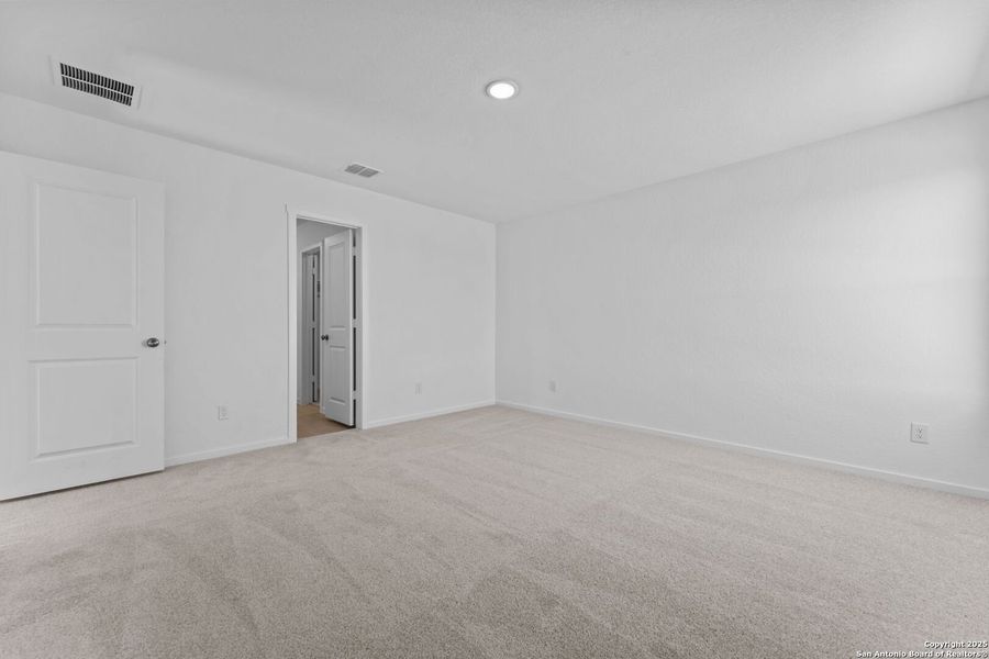 Spacious, unfurnished interior of a new home in Randolph Crossing: Cottage Collection, Converse (Image 12).