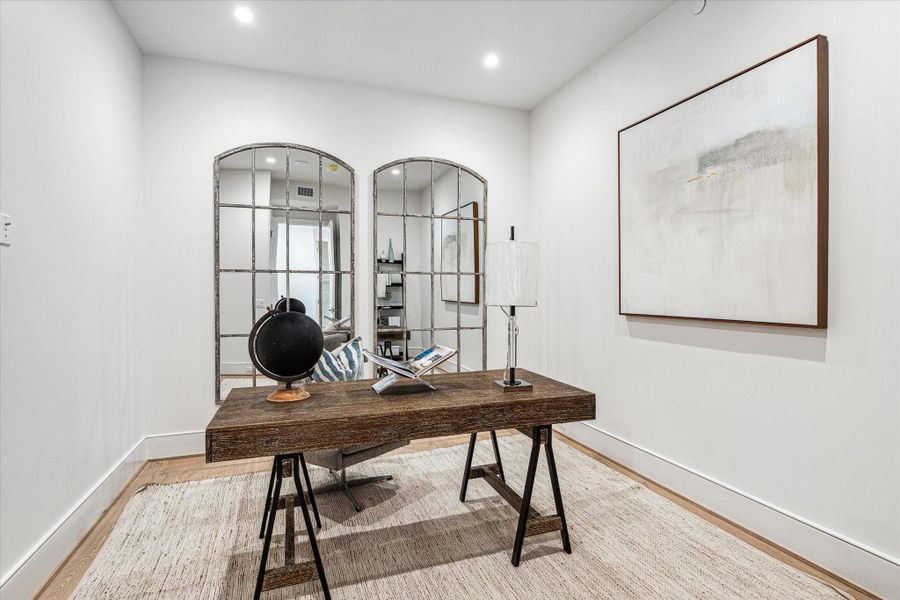 Private home office/study with a closet that can be an optional sleeping space. Photos are of a similar unit with the same floor plan