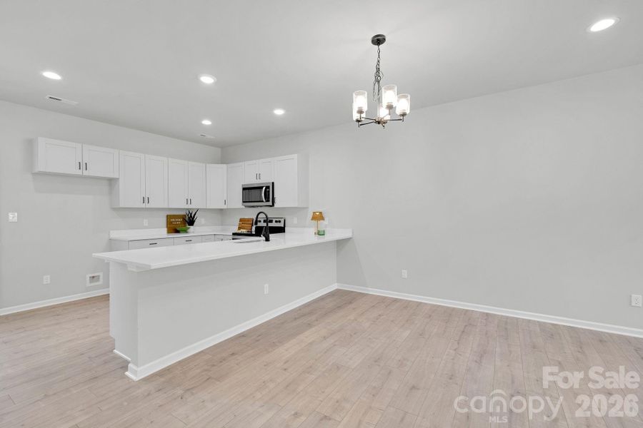 Furnished interior view inside a new home in , Concord (Image 9).