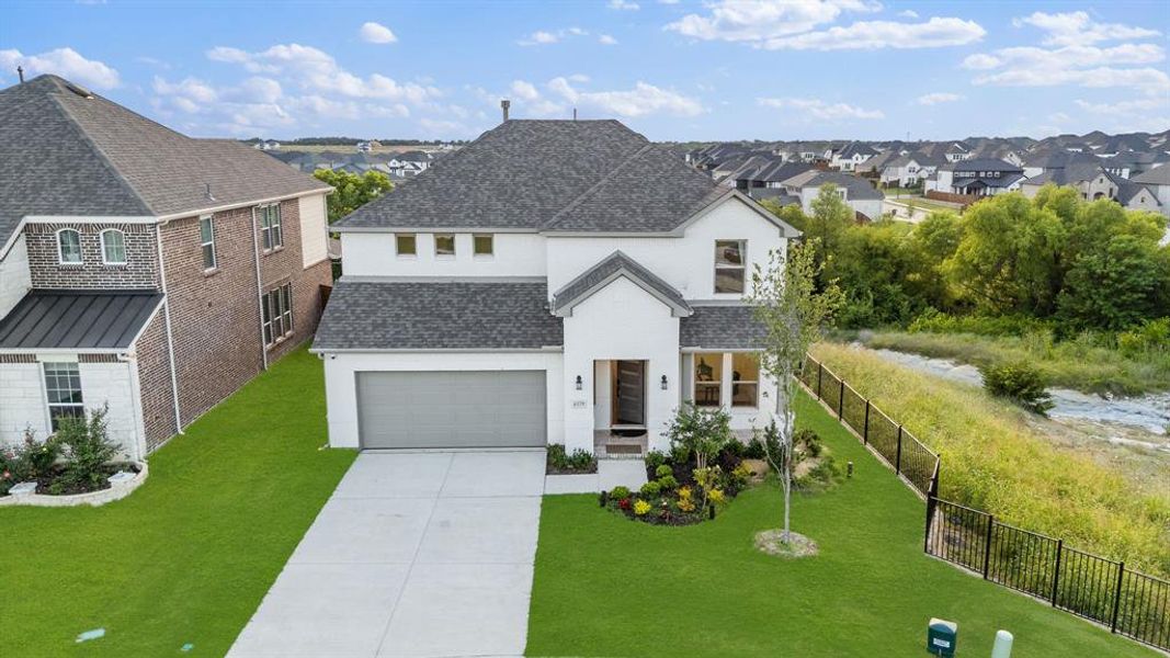 Front exterior of a new home in , McKinney, TX, highlighting curb appeal (Image 23). Front exterior of a new home in , McKinney, TX, highlighting curb appeal (Image 23).