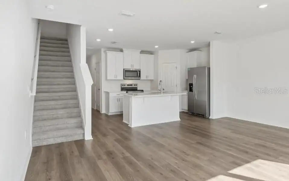 Furnished interior view inside a new home in Cagan Crossings West, Clermont (Image 4).