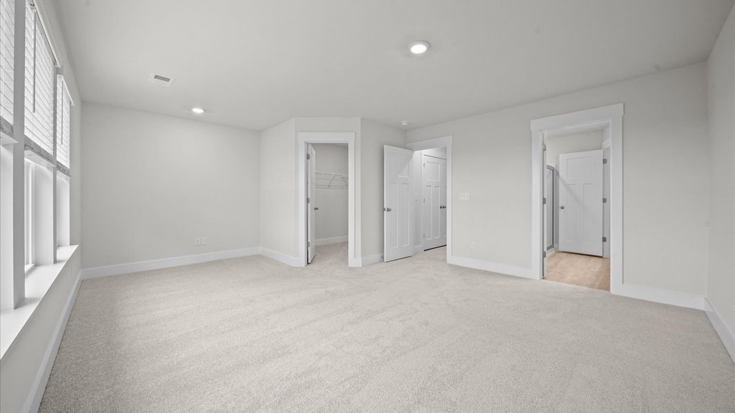 Accomplished design meets restful elegance in this exclusive primary suite by DRB Homes Accomplished design meets restful elegance in this exclusive primary suite by DRB Homes