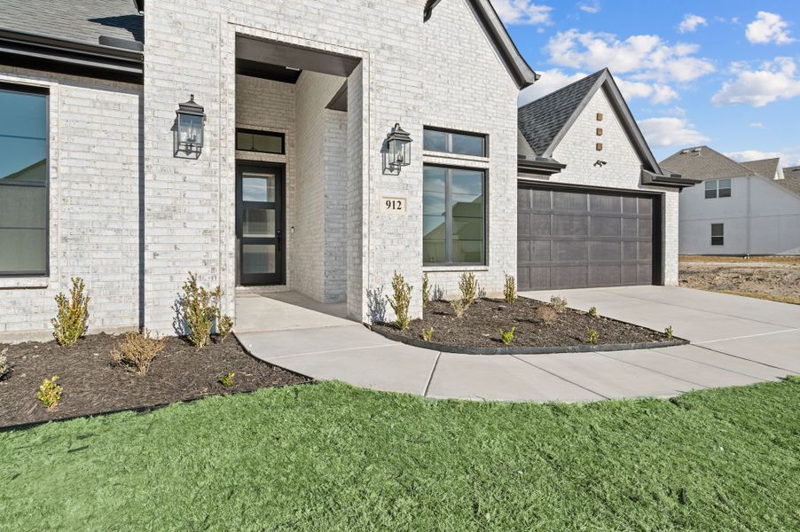 Exterior details and patio area of a home in Parks of Aledo, Aledo (Image 3).